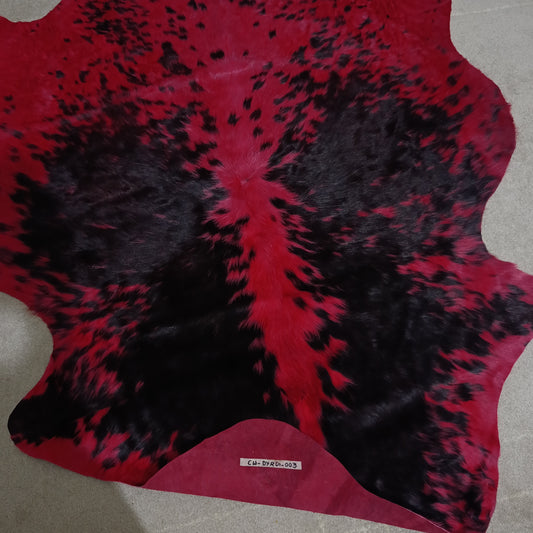Ruby Eclipse – Dyed Red Cowhide Rug with Fine Black Speckled Pattern