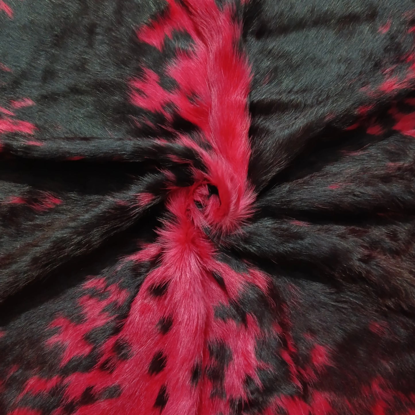 Ruby Eclipse – Dyed Red Cowhide Rug with Fine Black Speckled Pattern